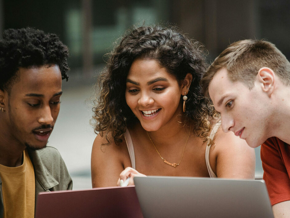 Students looking at laptop screens
