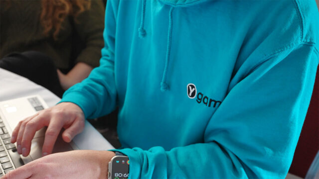 Person wearing Ygam hoodie